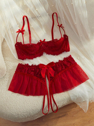 Semi-sheer red lace babydoll lingerie set featuring a flowy ruffle-hem skirt, spaghetti straps, underwire bralette top, and matching low-rise thong.