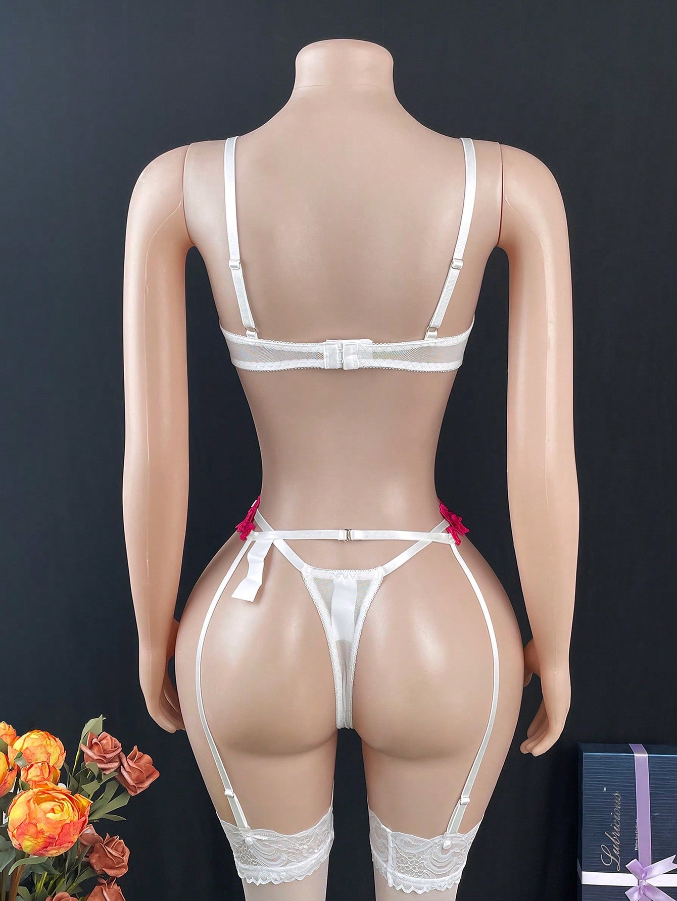 Women's 5-piece lingerie set with sheer mesh floral embroidery, underwire bra with adjustable spaghetti straps, and matching mid-rise thong pieces in a romantic floral style.