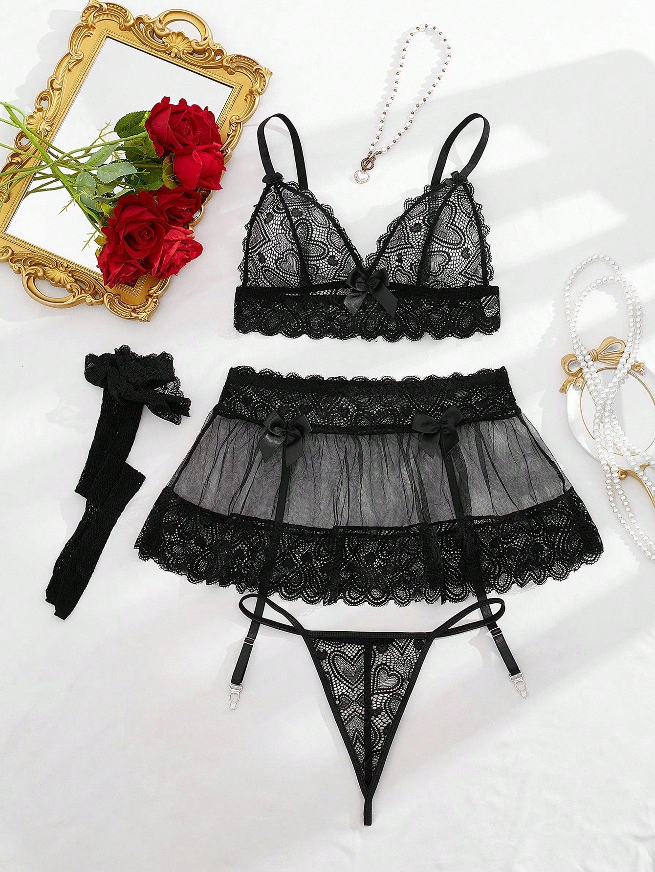 Women’s 5-piece sexy lingerie set featuring contrast lace and mesh details, including a wireless bra with adjustable spaghetti straps, a low-rise G-string thong, a short skirt, and two mesh stockings.