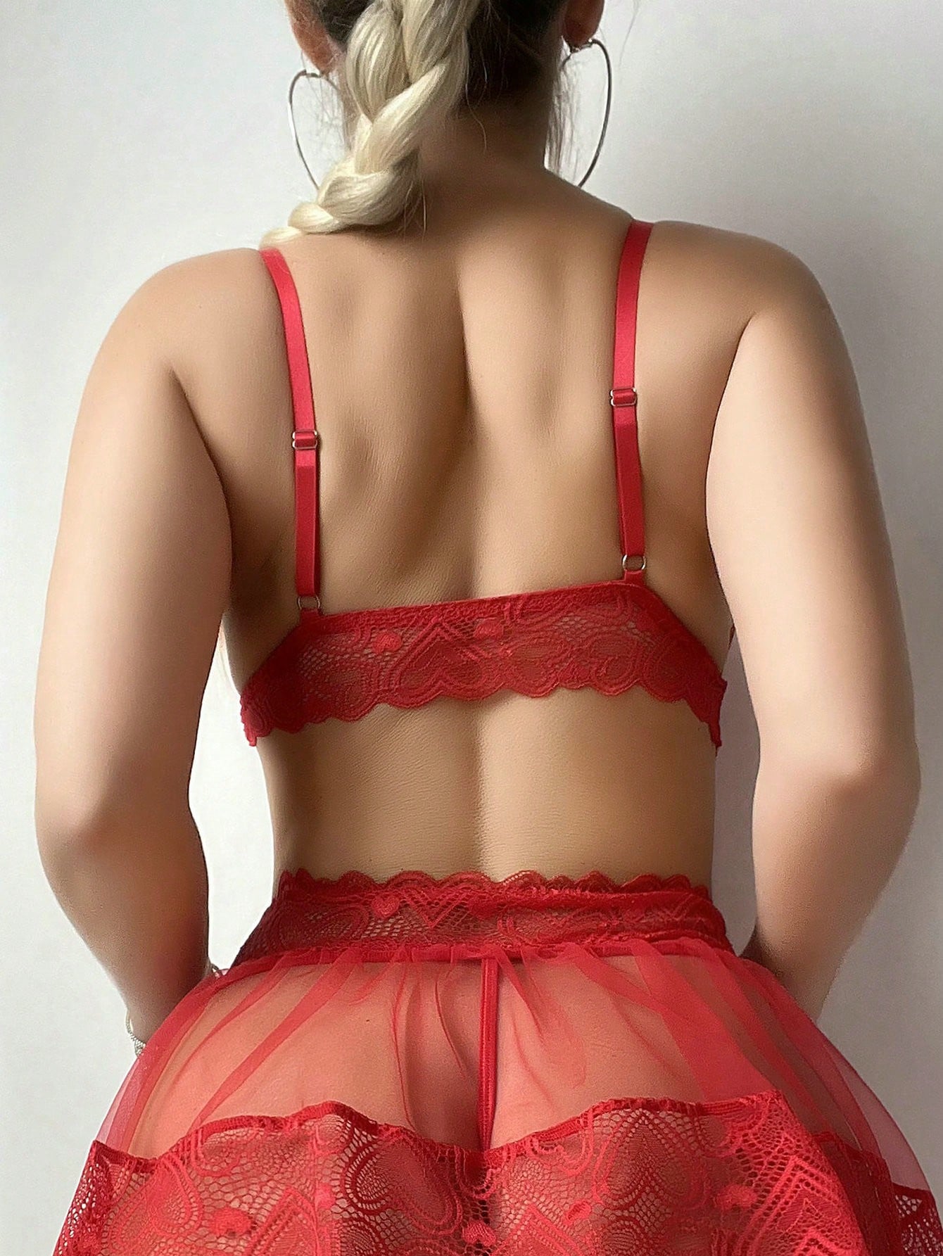 Women’s 5-piece sexy lingerie set featuring contrast lace and mesh details, including a wireless bra with adjustable spaghetti straps, a low-rise G-string thong, a short skirt, and two mesh stockings.