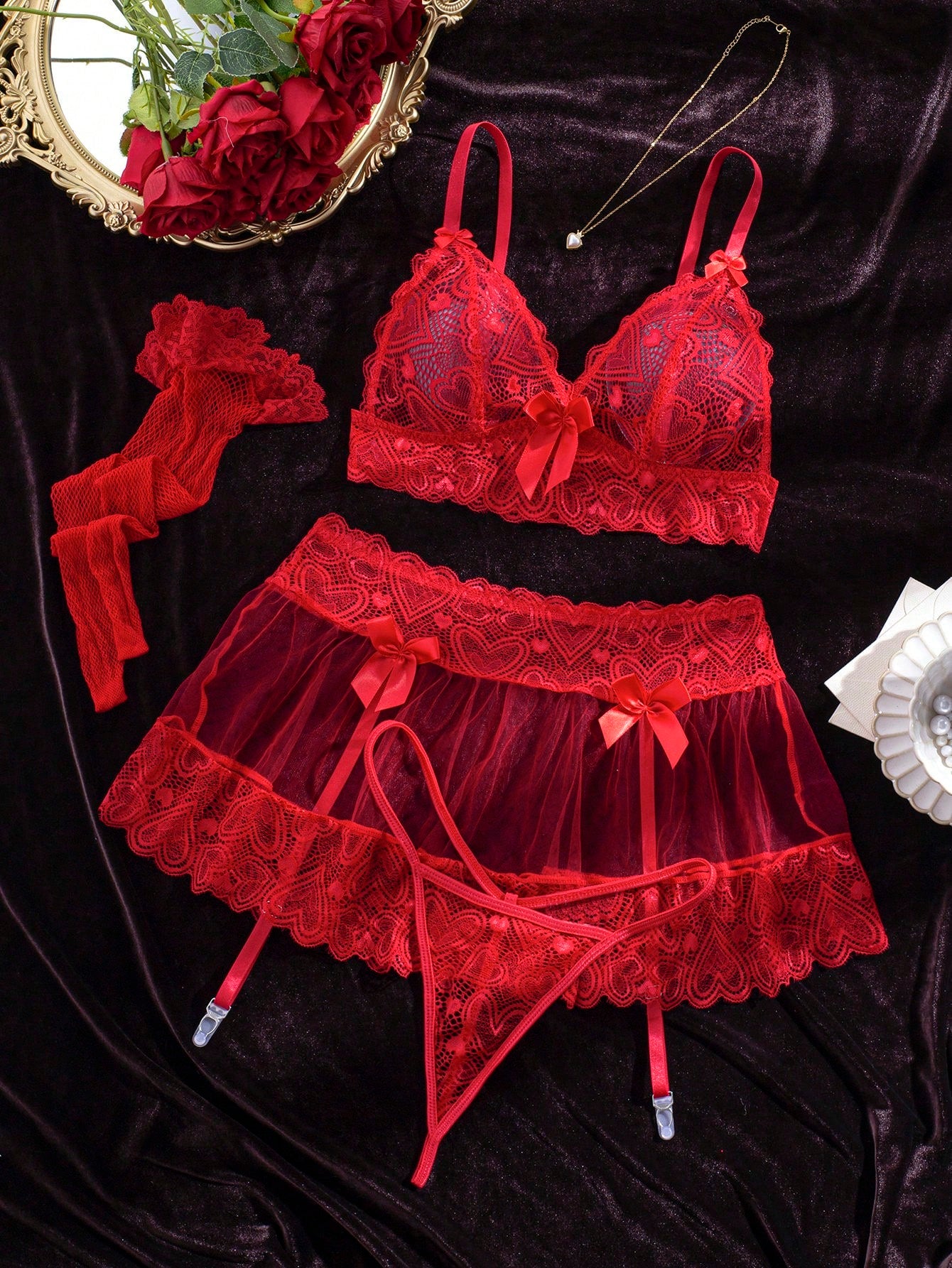 Women’s 5-piece sexy lingerie set featuring contrast lace and mesh details, including a wireless bra with adjustable spaghetti straps, a low-rise G-string thong, a short skirt, and two mesh stockings.