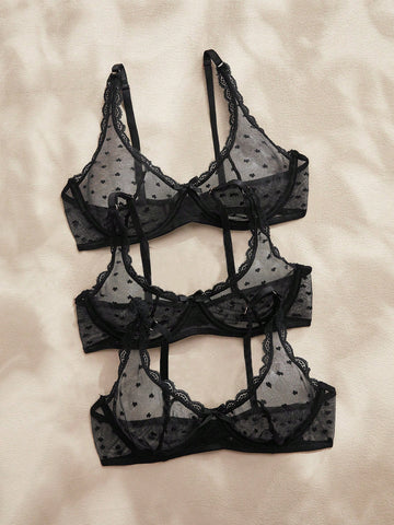 Women's solid color lace bra with sheer unlined design, bow detail, underwire support, and adjustable straps; romantic style push-up bralette for daily wear.