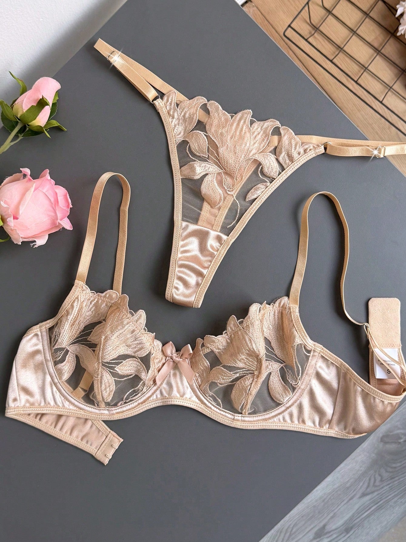 Women’s 2-piece sexy lingerie set featuring an embroidered sheer mesh demi bra with adjustable spaghetti straps and a matching low-rise thong.