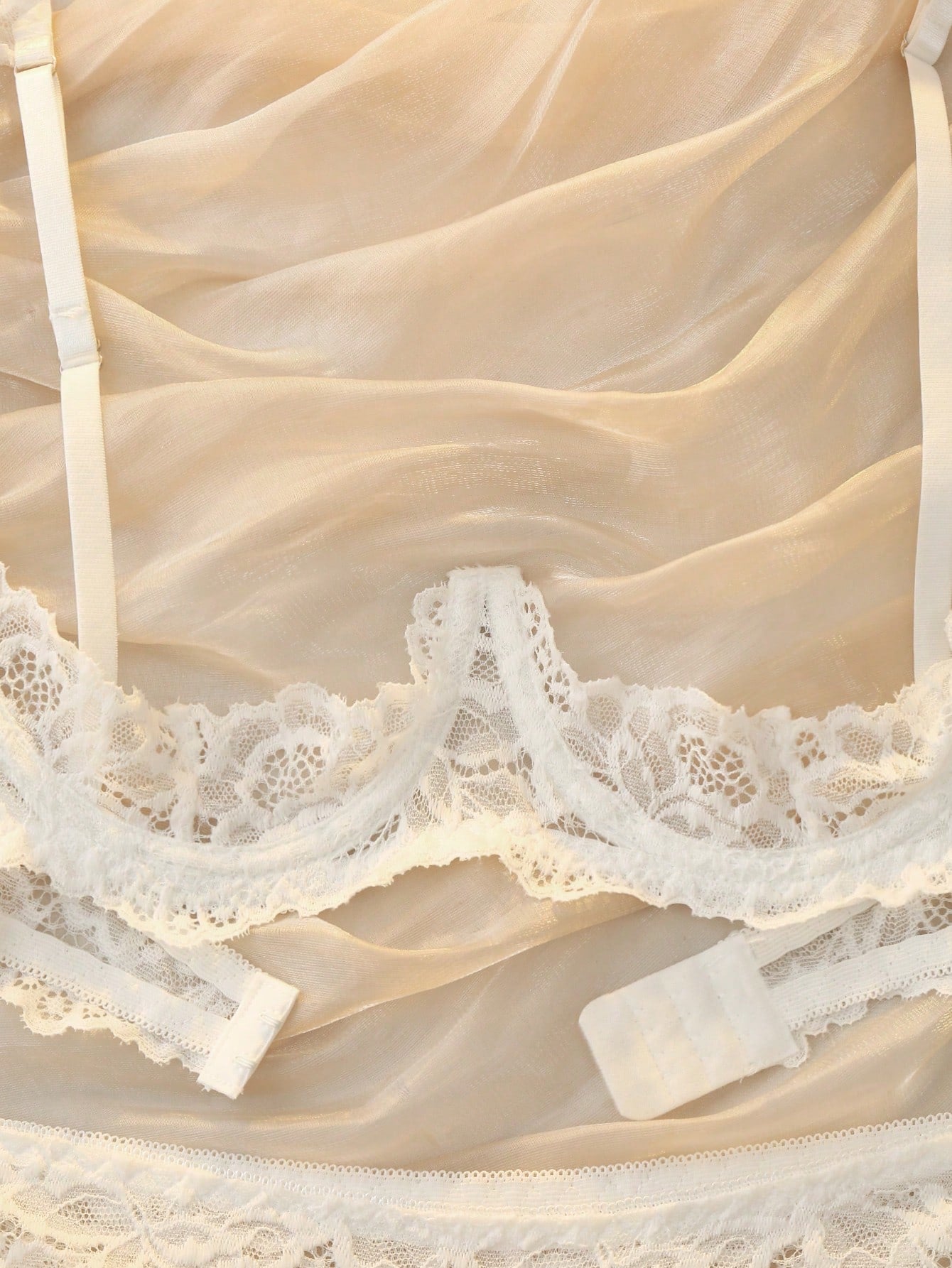 Women’s 2-piece contrast lace lingerie set with a sheer plain design, featuring an underwire open-cup bra with adjustable spaghetti straps and matching low-rise V-string panties.