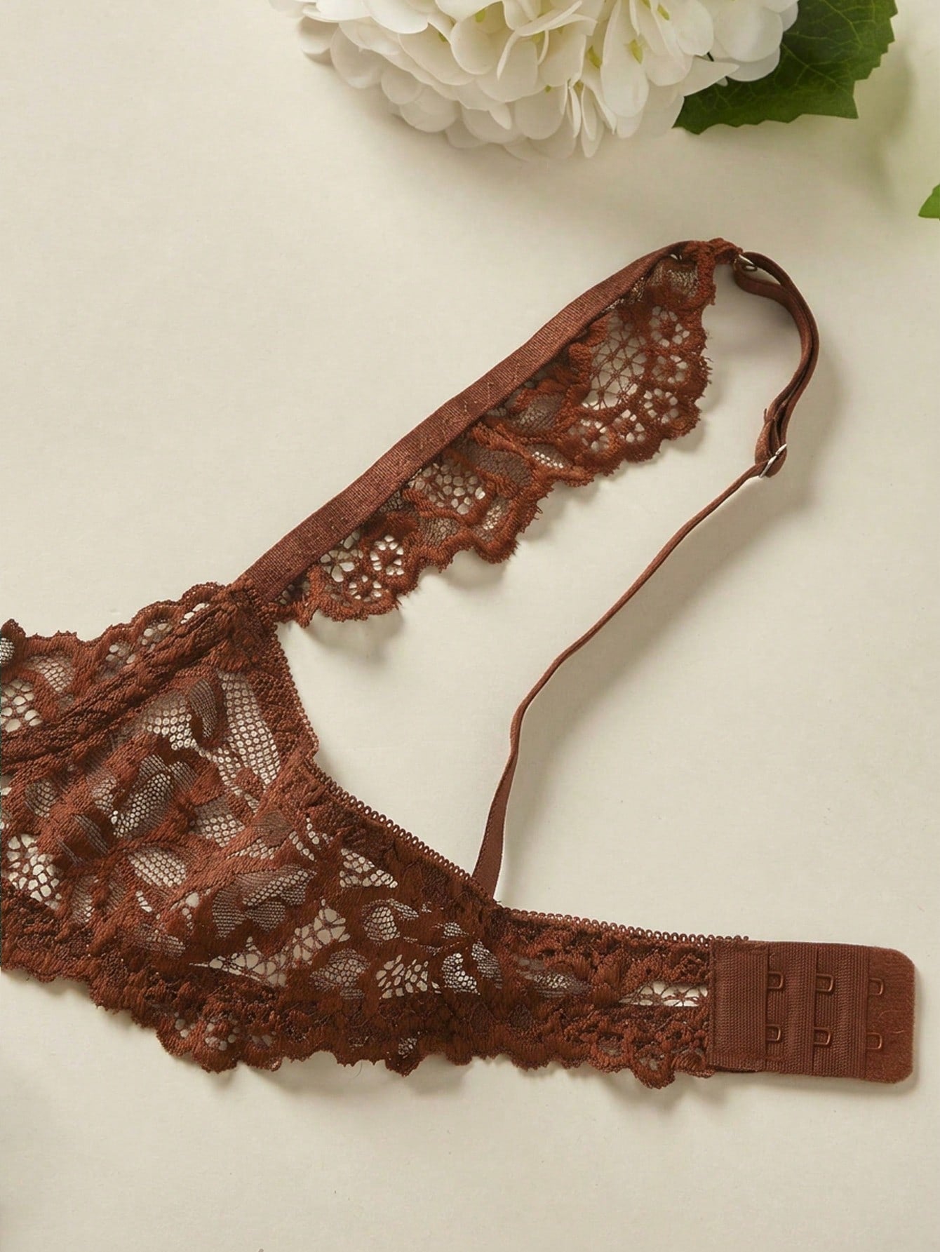 Women’s 2-piece contrast lace lingerie set with a sheer plain design, featuring an underwire open-cup bra with adjustable spaghetti straps and matching low-rise V-string panties.