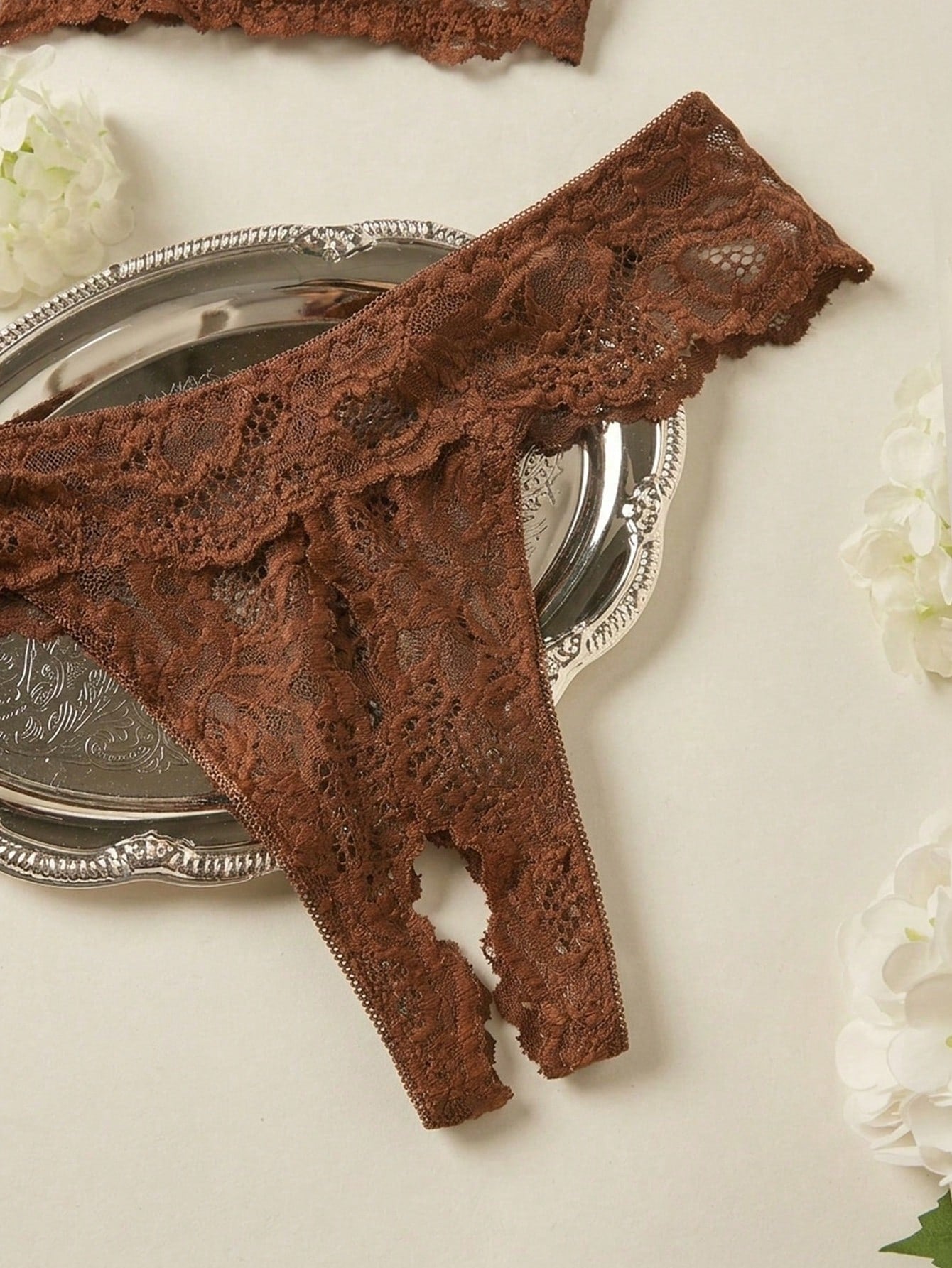 Women’s 2-piece contrast lace lingerie set with a sheer plain design, featuring an underwire open-cup bra with adjustable spaghetti straps and matching low-rise V-string panties.