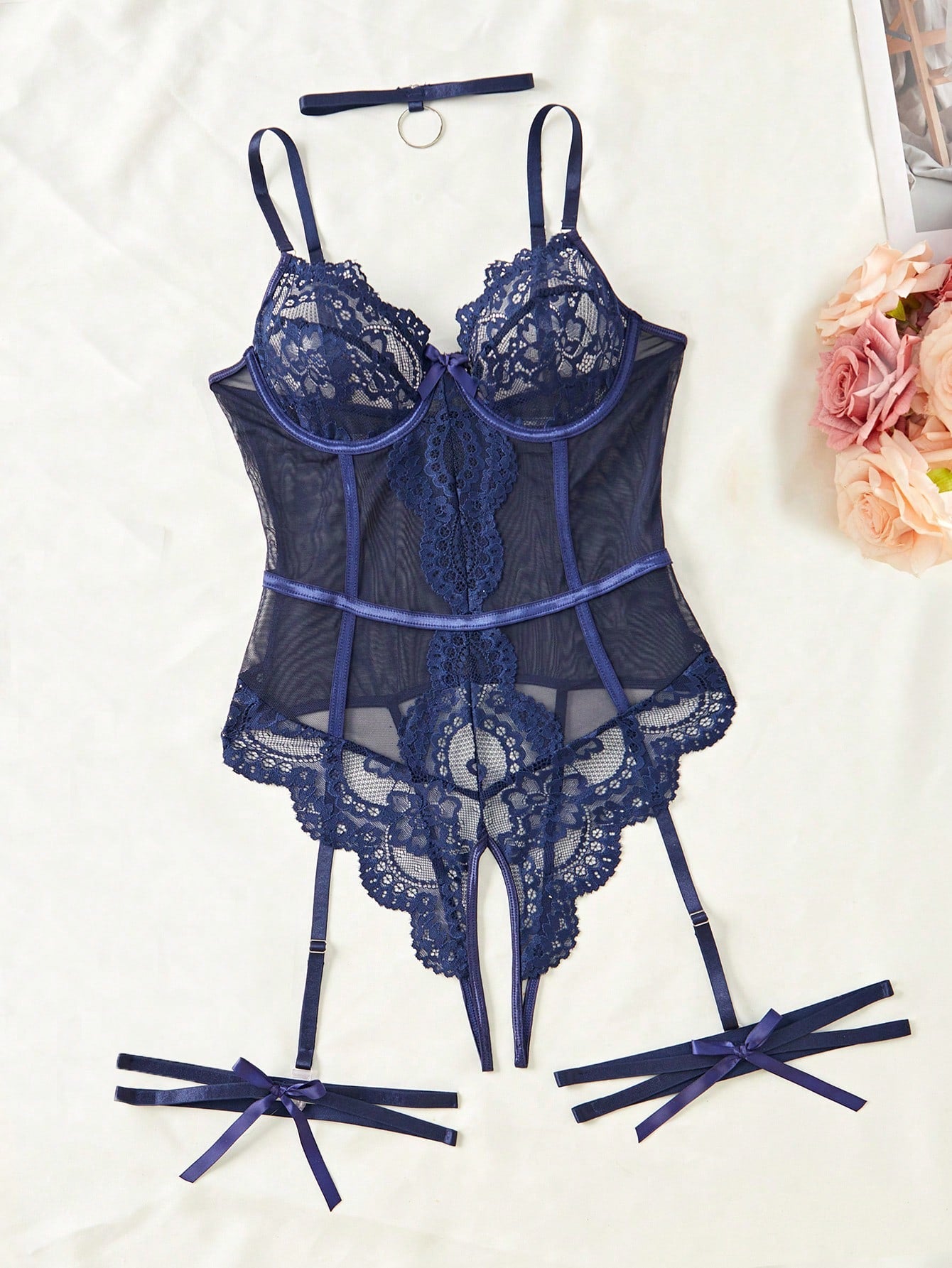 4-piece women’s lingerie set featuring a lace contrast mesh bodysuit with underwire, cut-out details, adjustable spaghetti straps, matching thong, and leg garters.