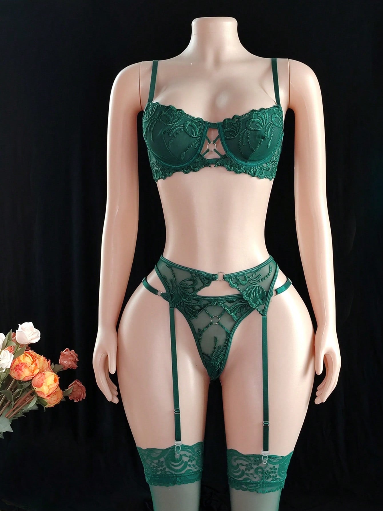 Floral embroidered mesh underwire garter lingerie set with adjustable spaghetti straps, criss-cross detail, and thong panty.