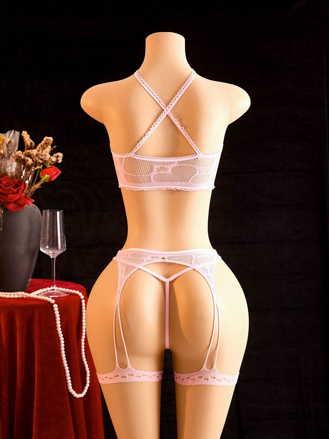 Pink solid-color semi-sheer mesh 3-piece women’s lingerie set featuring a wireless spaghetti-strap bralette with adjustable straps, backless detail, and matching low-rise thong and bottoms.