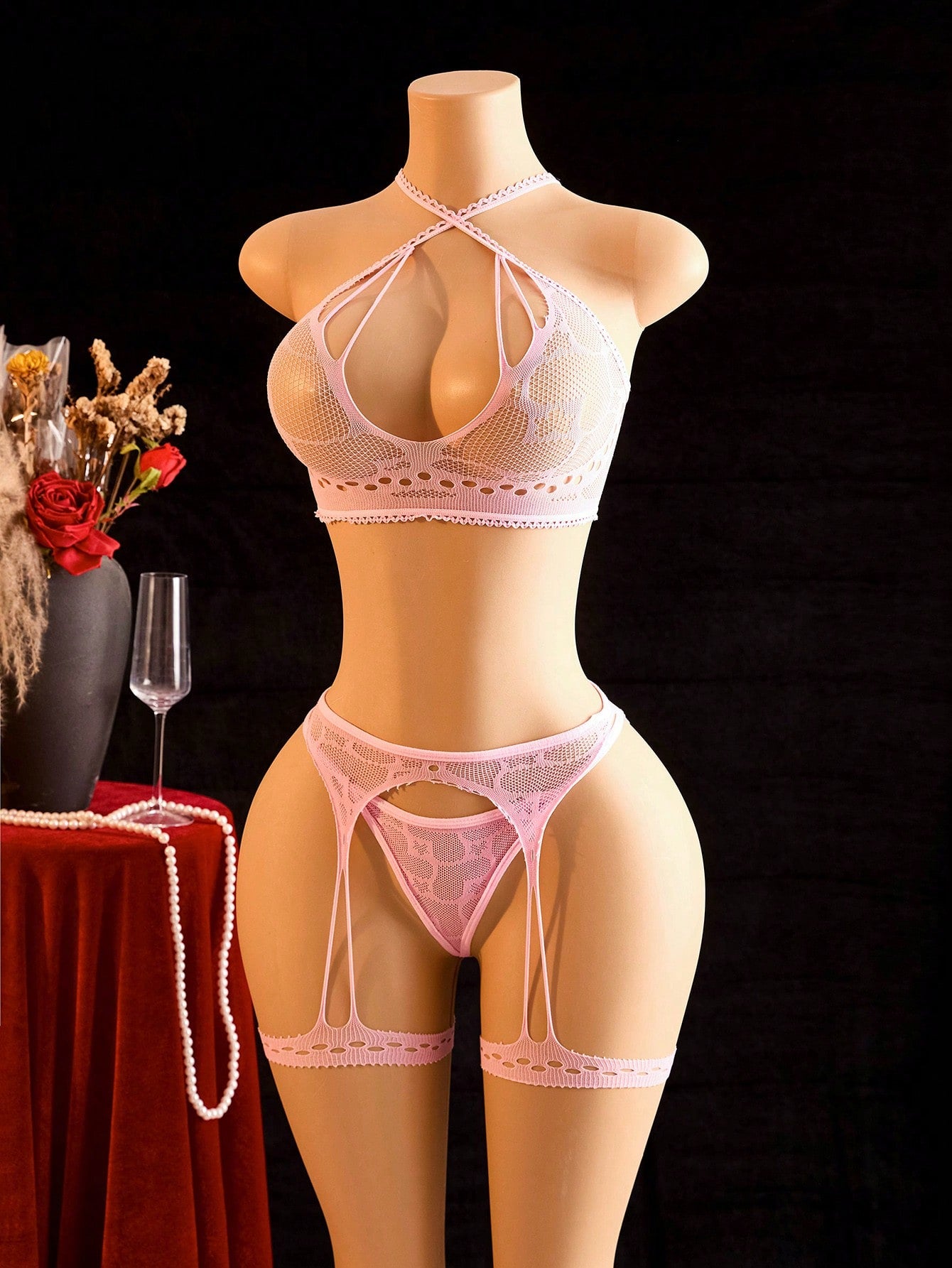 Pink solid-color semi-sheer mesh 3-piece women’s lingerie set featuring a wireless spaghetti-strap bralette with adjustable straps, backless detail, and matching low-rise thong and bottoms.