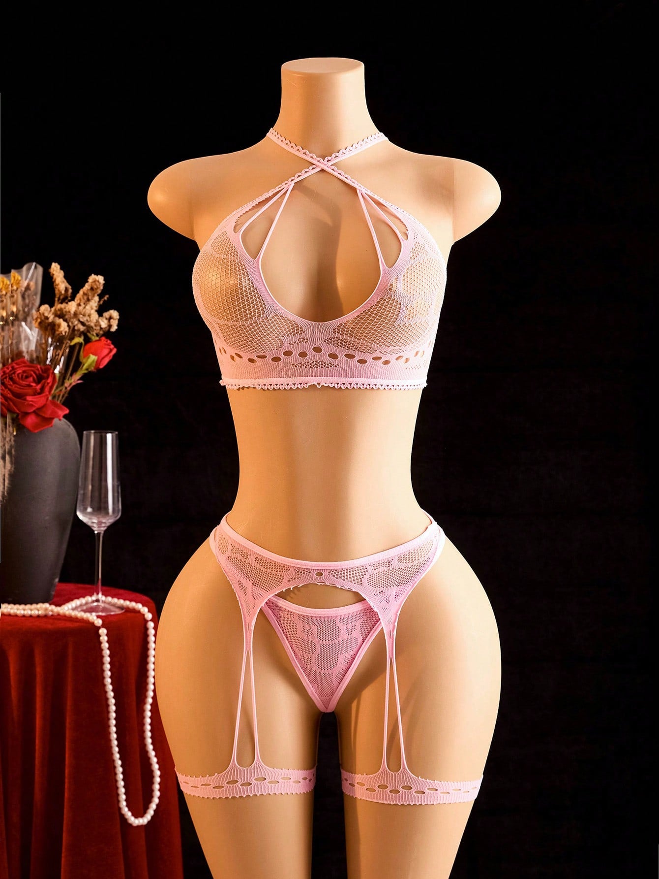 Pink solid-color semi-sheer mesh 3-piece women’s lingerie set featuring a wireless spaghetti-strap bralette with adjustable straps, backless detail, and matching low-rise thong and bottoms.