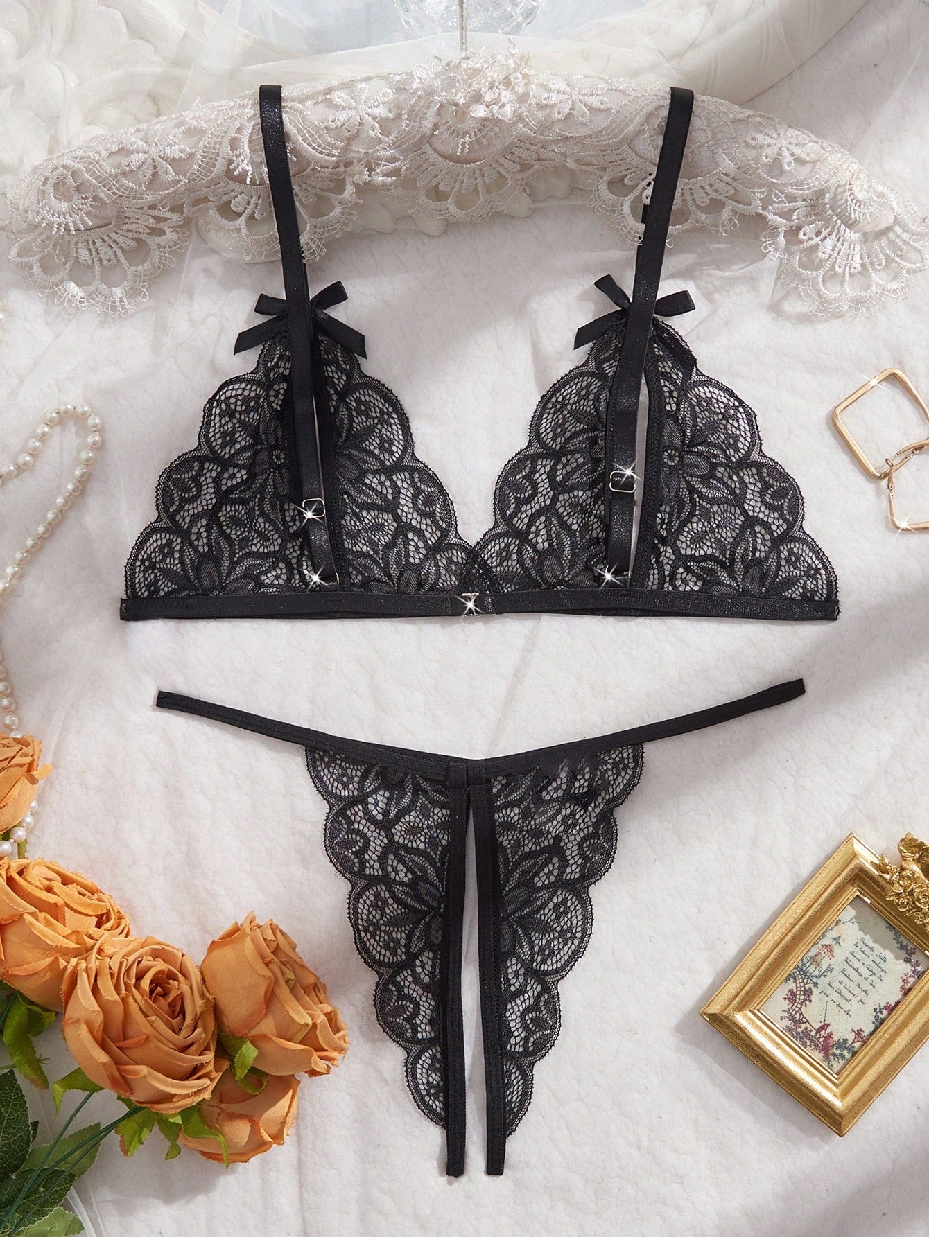 Two-piece women’s sexy lingerie set with a wireless bralette and T-back V-string panties, featuring bowknot decoration, hollow-out detailing, and contrast lace accents with adjustable spaghetti straps.