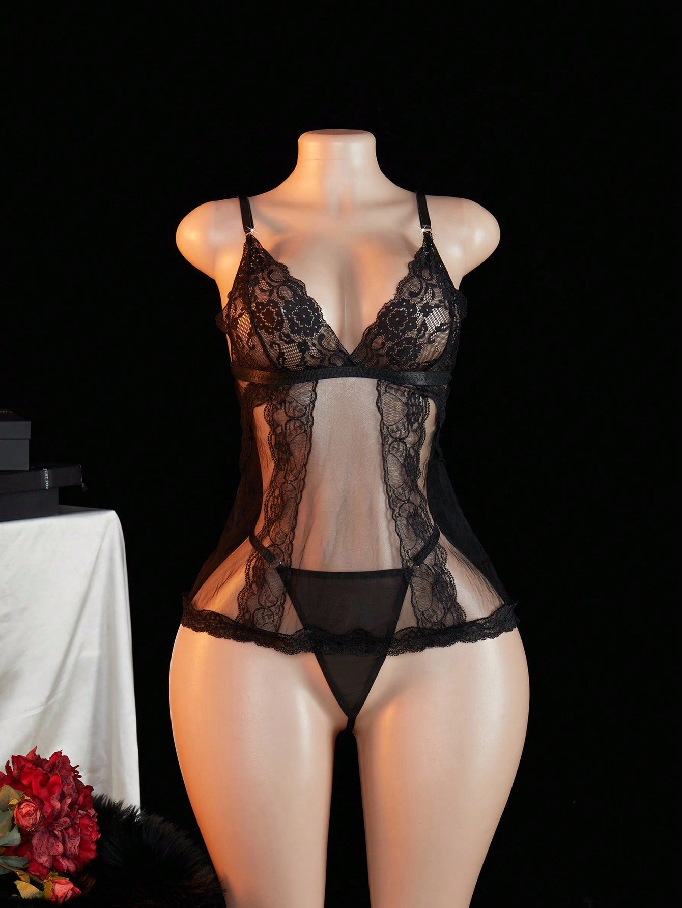 Women's 2-piece lace mesh lingerie set featuring a sheer, backless short nightgown with adjustable spaghetti straps and a matching low-rise thong (G-string); wireless triangle style, available in Black, Burgundy, and Multicolor.