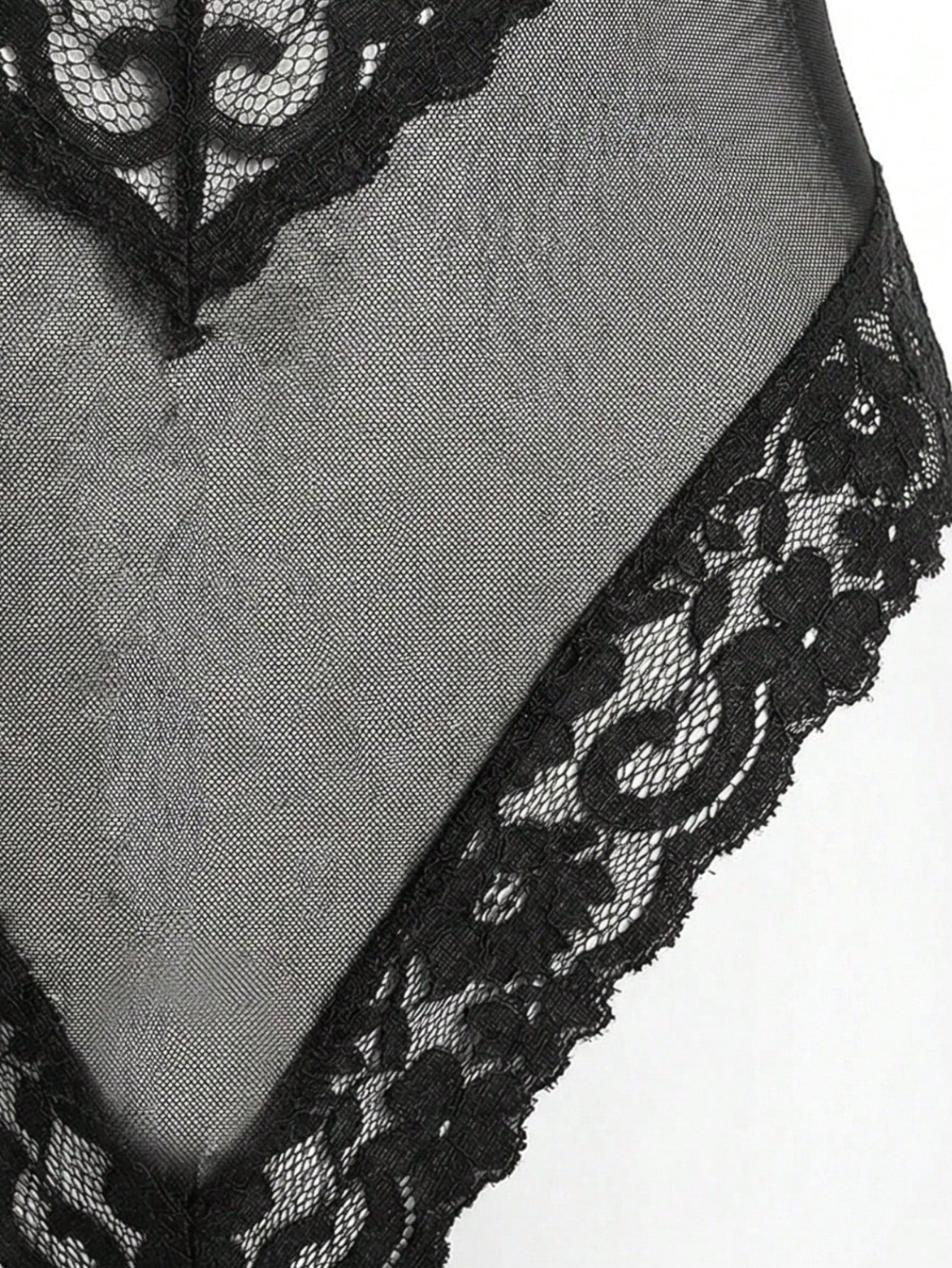 Black eyelash lace panel teddy bodysuit lingerie with sheer baroque pattern, spaghetti straps, triangle underwire bra, and thong back.