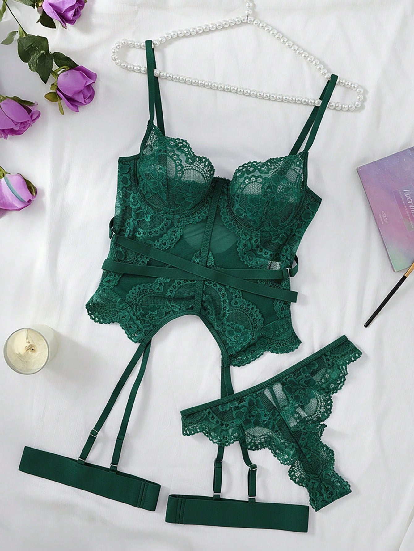 Women’s 4-piece lace lingerie set featuring a longline underwire bra with adjustable spaghetti straps, matching low-rise thong panties, and decorative ribbon details with cutout accents.