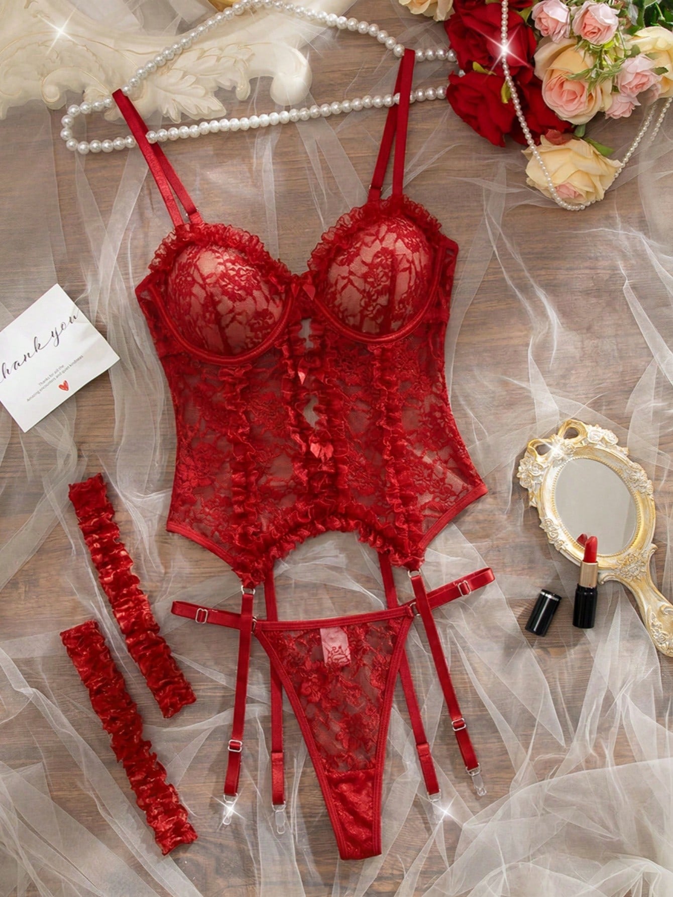 Women’s sexy lace lingerie set with lace-trim blouse top, matching panty thong, and garter details; sheer hollow-out style with adjustable spaghetti straps and bow accents.