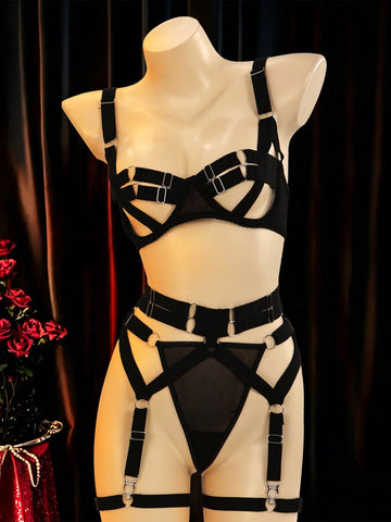 Black 5-piece women's sexy lingerie set with tie-up design, cut-out details, ring accents, adjustable straps, and low-rise thong bottoms in a plain pattern.