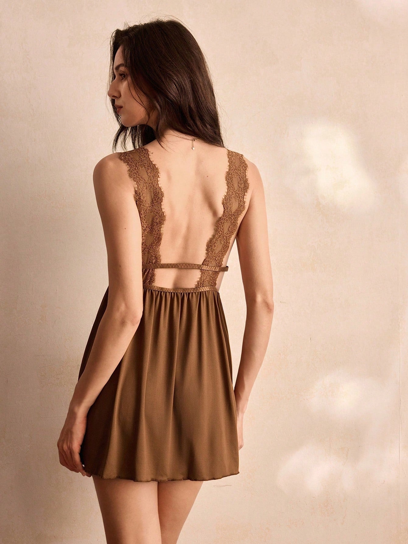 Coffee brown sleeveless women's nightgown with contrast lace splice, deep V neckline, midi length, and open back design