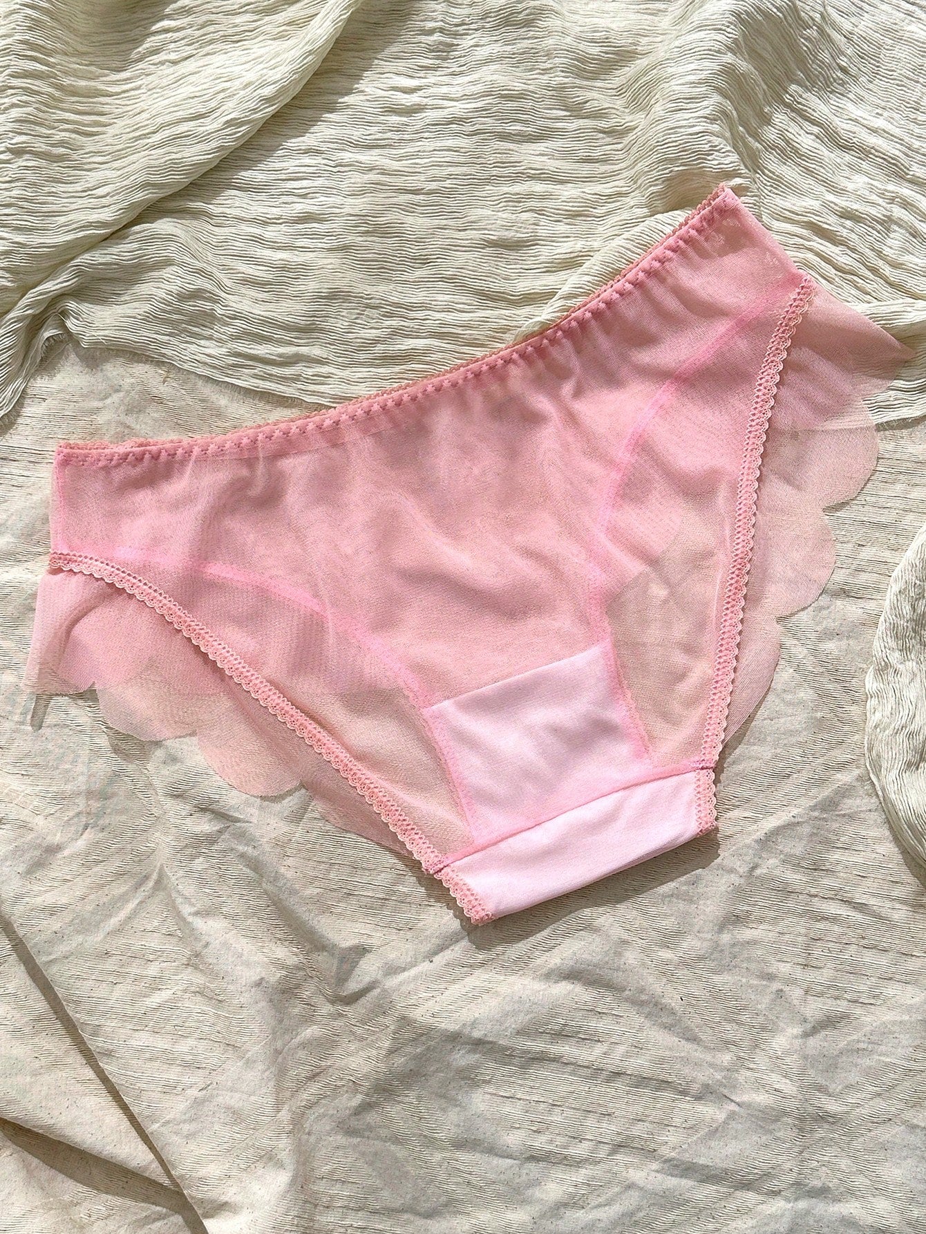 Baby pink women's mid rise brief panties with bow decor, sheer details, and a plain cute-sweet design