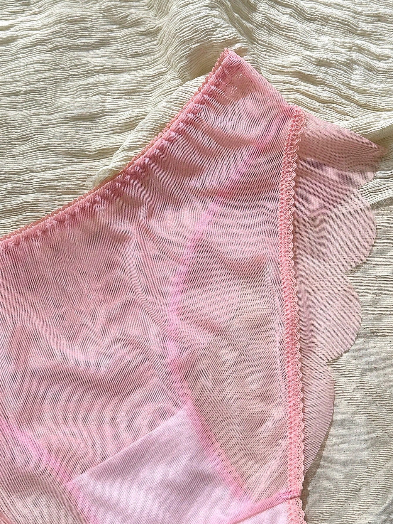 Baby pink women's mid rise brief panties with bow decor, sheer details, and a plain cute-sweet design