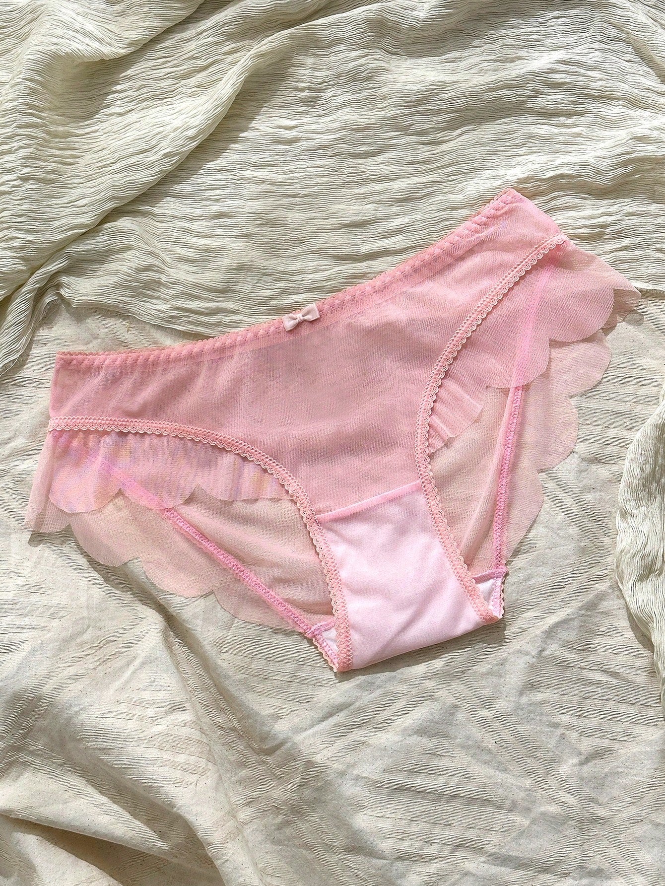 Baby pink women's mid rise brief panties with bow decor, sheer details, and a plain cute-sweet design