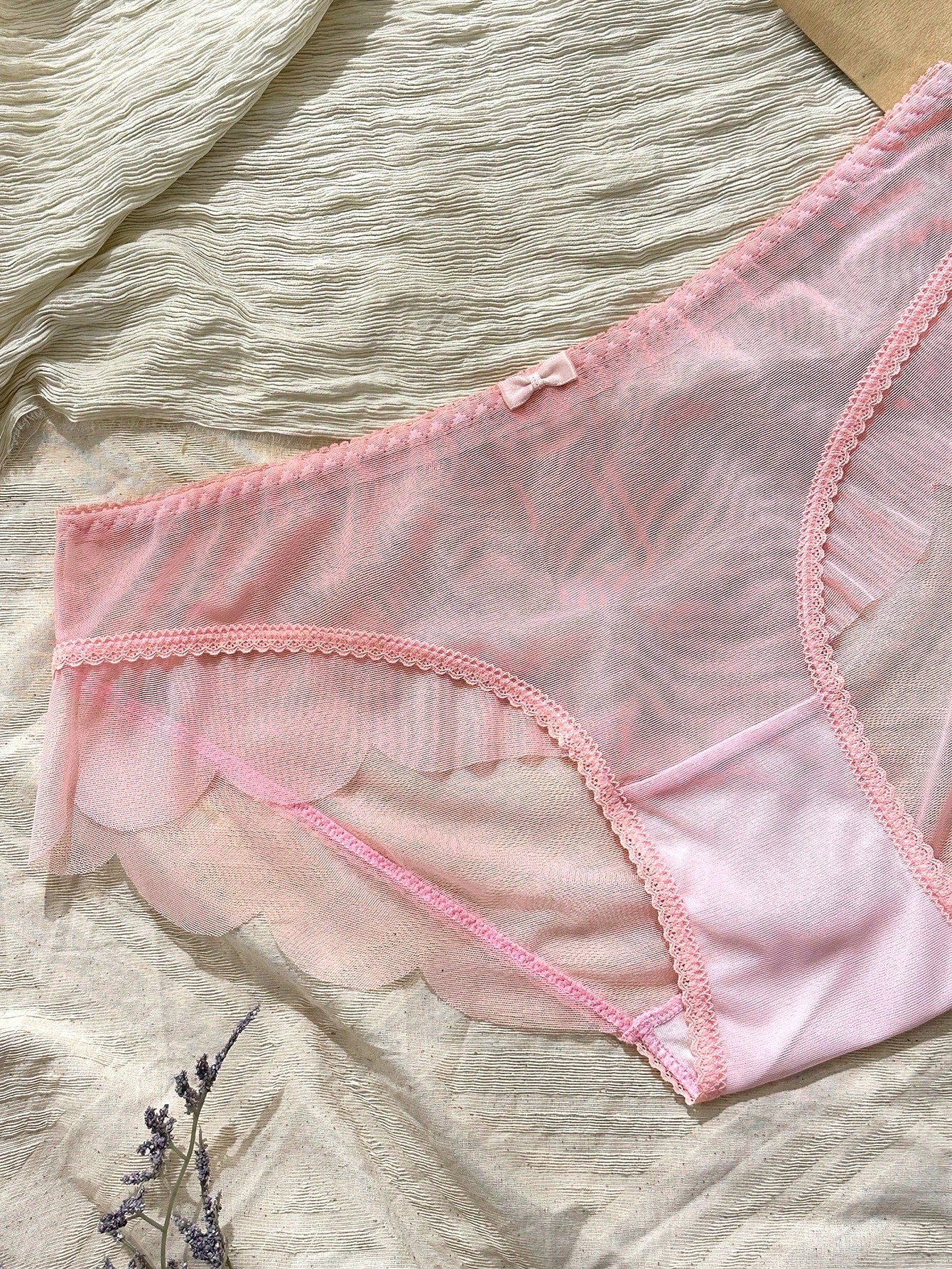 Baby pink women's mid rise brief panties with bow decor, sheer details, and a plain cute-sweet design