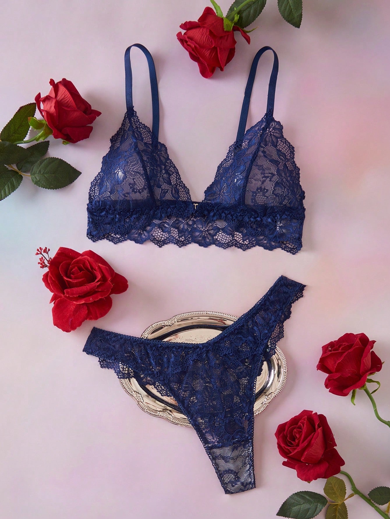 Navy blue floral lace 2-piece lingerie set with wireless triangle bra, adjustable spaghetti straps, sheer lace details, and matching mid-rise thong.