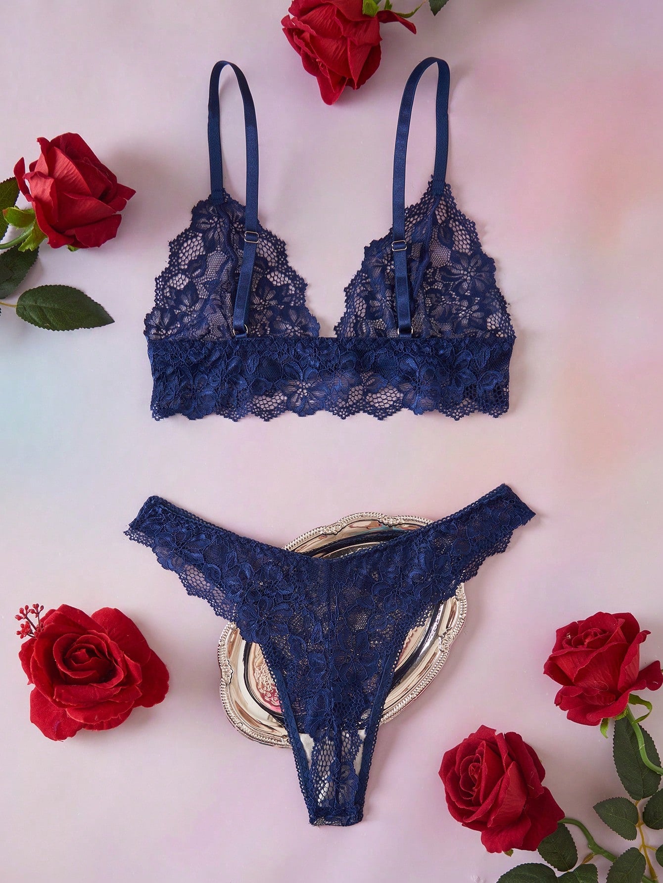 Navy blue floral lace 2-piece lingerie set with wireless triangle bra, adjustable spaghetti straps, sheer lace details, and matching mid-rise thong.