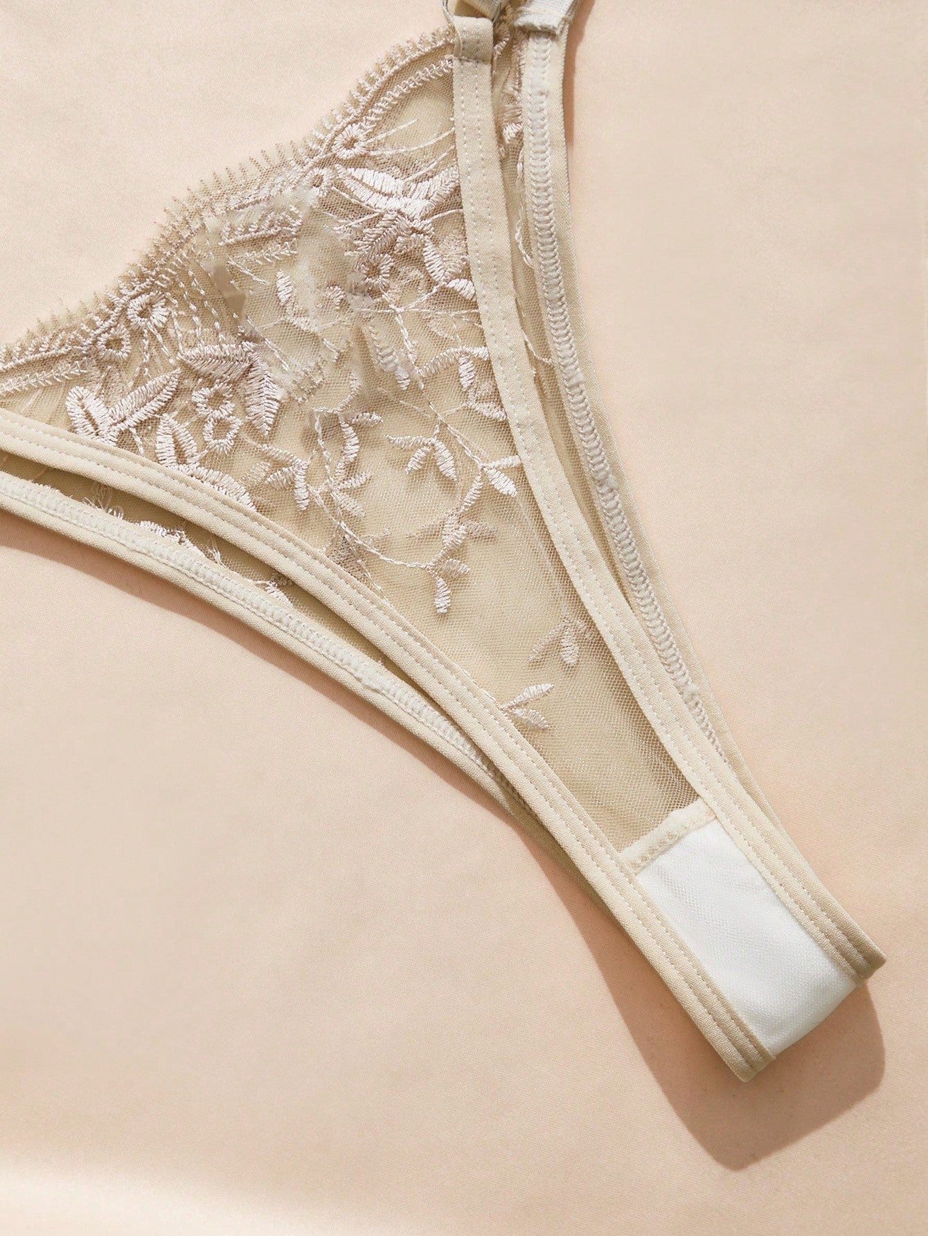 Embroidered sheer mesh demi bra and low-rise thong lingerie set with plant pattern and adjustable spaghetti straps
