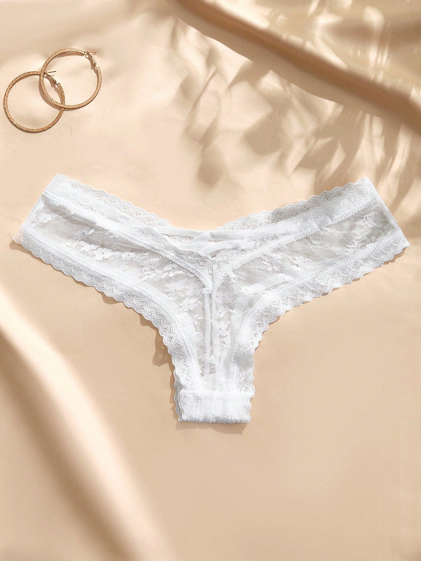 White low-rise women's brief panty with contrast lace and graphic plant pattern, romantic bridal-inspired style