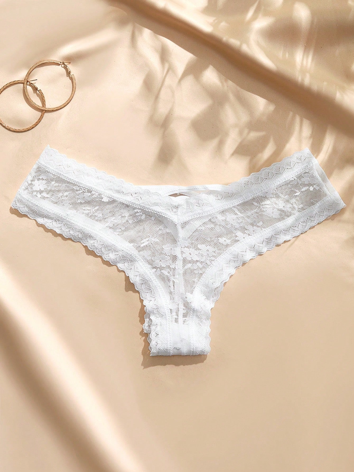 White low-rise women's brief panty with contrast lace and graphic plant pattern, romantic bridal-inspired style