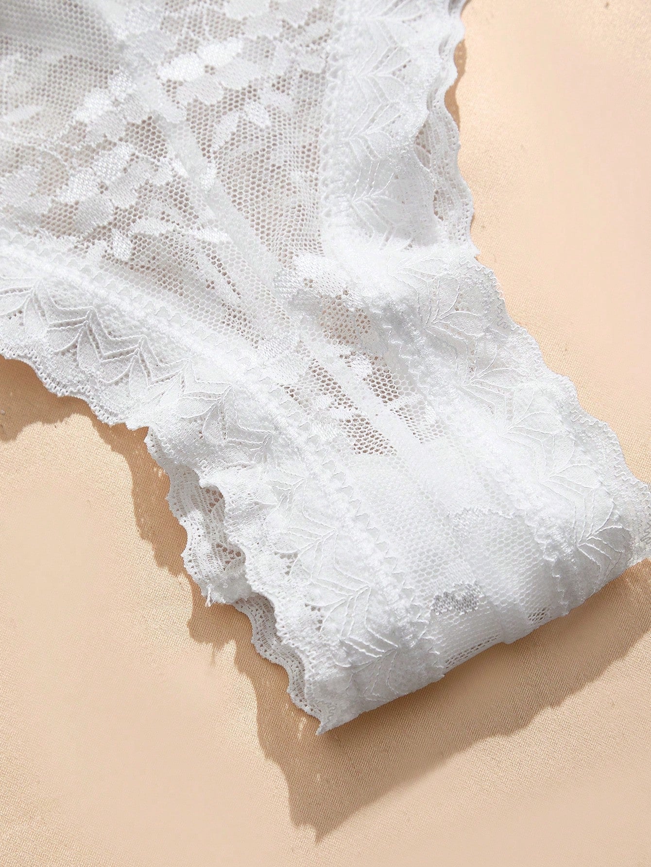 White low-rise women's brief panty with contrast lace and graphic plant pattern, romantic bridal-inspired style